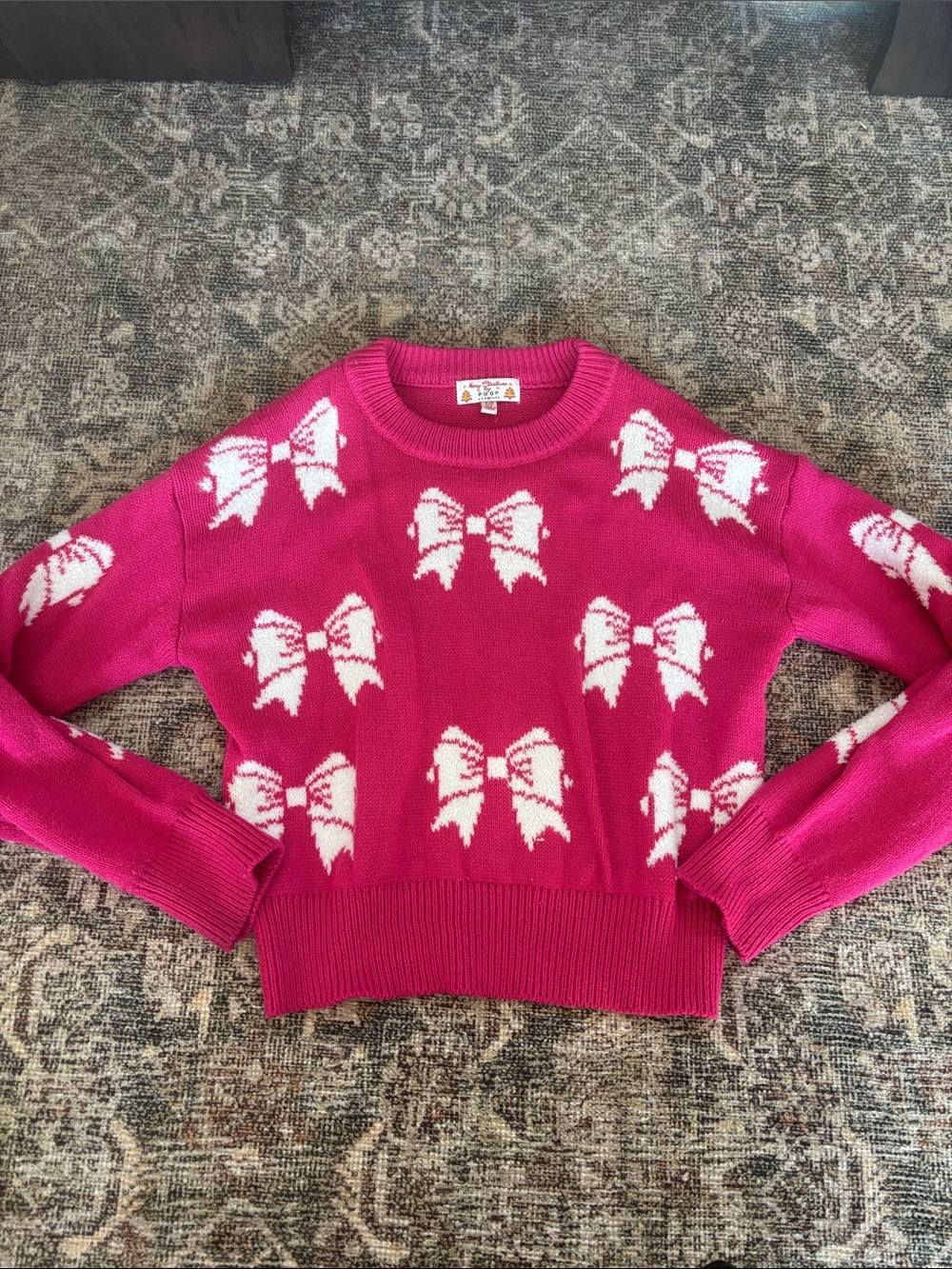 Women’s (junior) Fuchsia Bow-Print Sweater